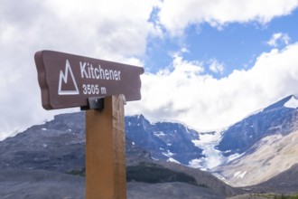 Brown wooden kitchener sign marking an altitude of 3505 meters, with the athabasca glacier and