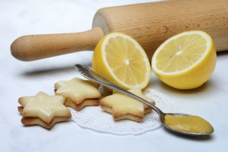 Lemon cookies, lemon and spoon with lemon curd