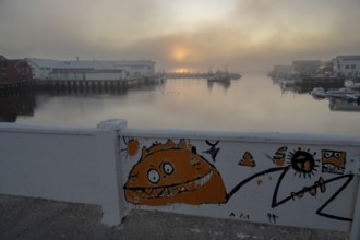 Street art on bridge at the harbor. Vardö street art phenomenon created by the festival Komafest,