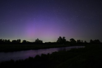 Aurora borealis aurora borealis on the Hunte dyke, Dümmerniederung nature park Park, Lower Saxony,