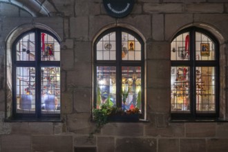 View through the windows of the historic restaurant, Albercht Dürer Stuben, in the old town with