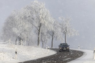 Winter in the Swabian Jura. Country road with snowy landscape near Westerheim, Alb-Donau-Kreis,