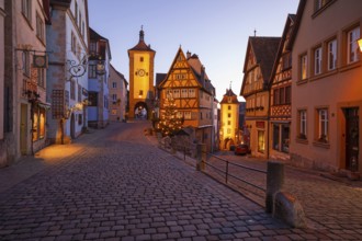 December 25, 2025: Christmastime at Plönlein — Rothenburg ob der Tauber, Bavaria, Germany. Festive