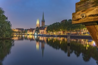 Old town with St. Mary's Church and St. Peter's Church and the Trave at dusk, Lübeck,