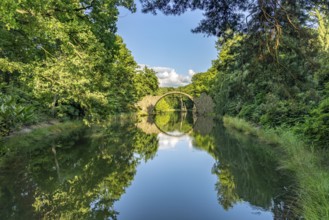 The Rakotz Bridge or Devil's Bridge on Lake Rakotz in the Kromlau Azalea and Rhododendron Park,