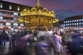 Nostalgic children's carousel at the children's Christmas market in the evening, Hans-Sachs-Platz,