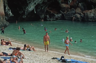 People bathing and sunbathing on Pranang Cave beach, two years in front of the tsunami, Krabi,