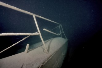 Ledi wreck, wreck of a Ledi ship, cargo ship for mass freight, bulk cargo taken at night in Lake