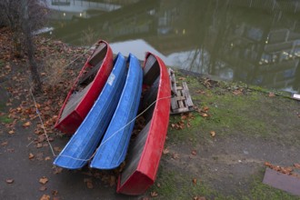 Assembled rowing boats on the banks of Pegnitz, river in Nuremberg, Middle Franconia, Bavaria,