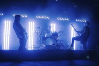 Bass player Chris Wendel, drummer Yuri Cernovolov and guitarist Ramin Tehrani from Engst live on