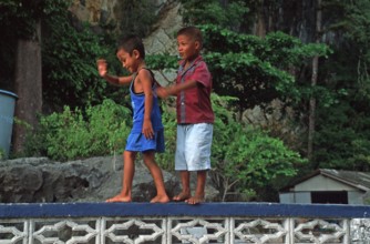 Little boys, children in the stilt village of Ko Pannyi in Phangnga Bay near Ko Phuket, two years