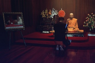 Wax monk at Wat Chalong monastery, believer praying, Ko Phuket, Thailand, December 2002, vintage,