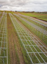 Structures of a solar plant during the construction phase on green fields, energy transition,