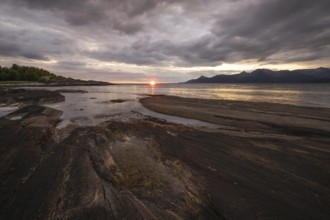 The Vestfjord in Nordland, Norway, offers a dramatic atmosphere near Bodø. Dark clouds are