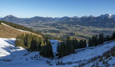 View from the Bolsterlanger Horn of villages in the Illertal and mountains of the Allgäu Alps,