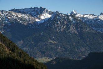 View from the high-altitude hiking trail from Bolsterlanger Horn to Riedberger Horn, snow-capped