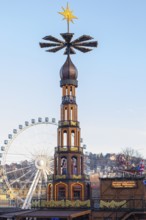 Stuttgart 2025 Christmas market on Schlossplatz with festive lights, a Christmas pyramid, mulled