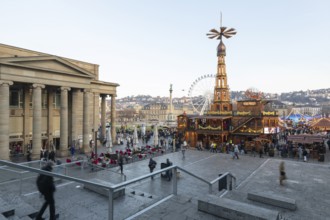 Stuttgart 2025 Christmas market on Schlossplatz with festive lights, a Christmas pyramid, mulled