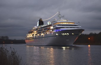 Cruise ship AMADEA sails in front of sunrise in the Kiel Canal, NOK, Kiel Canal, Kiel Canal,