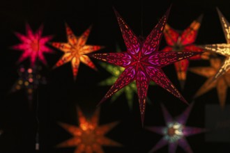 Colorful Christmas stars, sales stand, baroque Christmas market, blue hour, dusk, Ludwigsburg,
