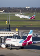 Eurowings aircraft, at terminal A and at takeoff, Düsseldorf airport, DUS