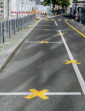 Yellow road marking at construction sites in Berlin, Germany