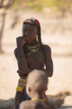 Portrait, brightly decorated girl of the Hakaona tribe, also Havakona or Hakawona, near Opuwo,
