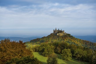 Castle and autumnal forest, Hohenzollern Castle, sunrise, Hechingen, Swabian Jura,