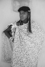 Black and white, portrait, brightly decorated woman of the Hakaona tribe, also Havakona or