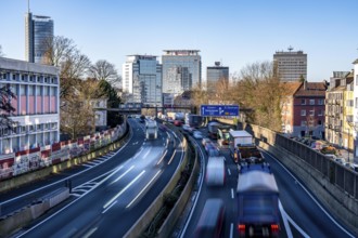 The A40 motorway, Ruhrschnellweg, in Essen, city skyline, Evonik office building, traffic jam in