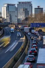 The A40 motorway, Ruhrschnellweg, in Essen, city skyline, Evonik office building, traffic jam in