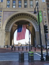 American flag fluttering, distinctive archway, Boston Harbor Hotel, Rowes Wharf, Freedom Trail,
