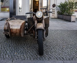 Retro motorcycle with sidecar, old and rusted, roadworthy and officially approved, Berlin, Germany