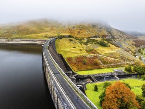 Autumn over Claerwen Dam, Claerwen Valley, Elan Valley Reservoir, Rhayader, Powys, Wales, UK