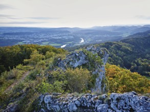 View from the Gisliflue of an autumnal forest with the Jura foothills behind, Talheim, Canton,