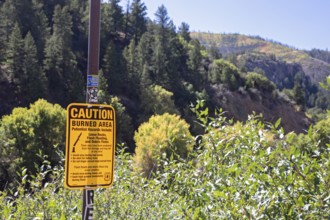 Gypsum, Colorado - A sign at an I-70 rest area in Glenwood Canyon warns of hazards that facing