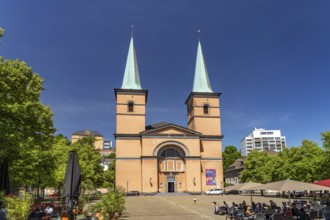 Dining on Laurentiusplatz and the Basilica of St. Lawrence in Elberfeld, Wuppertal, North