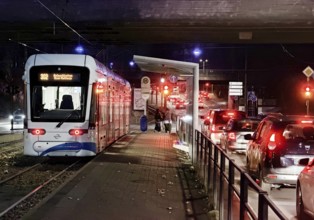 Bogestra tram line 302 at Ernst-Kuzorra-Platz der Kurt-Schumacher-Straße in the evening,