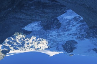 The Moiry glacier and mountain peaks are reflected in Lac de Chateaupre, Val d'Anniviers, Valais