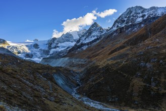 Clouds over the peaks of the Grand Cornier, Tete Blanche and Pointe Moiry mountains, Val
