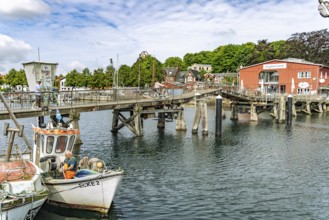 Eckernförde wooden bridge and the Siegfried shipyard at the inland port in Eckernförde,