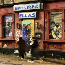 Decaying façade covered with graffiti in a no-go area, Gelsenkirchen, Ruhr area, North