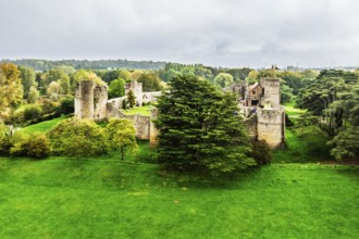 Autumn Colours over ruins of Caldicot Castle from a drone, Caldicot, Monmouthshire, Wales, UK