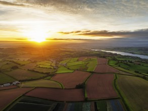 Colours of autumn Fields and Farms over Sheldon from a drone, Torbay, Devon, England, United