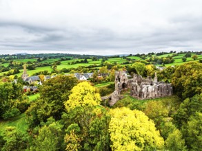 Autumn Colours over ruins of Grosmont Castle from a drone, Grosmont, Monmouthshire, Wales, UK
