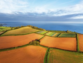 Colours of autumn Fields and Farms over Sheldon from a drone, Torbay, Devon, England, United