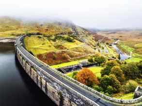 Autumn over Claerwen Dam, Claerwen Valley, Elan Valley Reservoir, Rhayader, Powys, Wales, UK