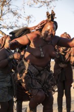 Himba woman dancing euphorically, traditional dance, traditional Himba village, Kaokoveld, Kunene,