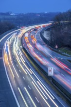 Evening traffic on the A52 motorway, between Düsseldorf and Essen, at the Ruhr Valley Bridge,