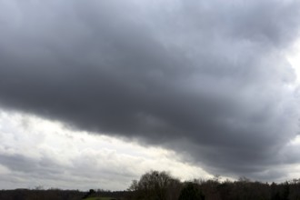 Large grey cloud roller Stratocumulus cluster layer cloud during high winter conditions,